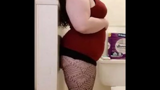 Meaty Milf wearing Fishnets in Bathroom with Dildo Stuck to Wall in BOOTY