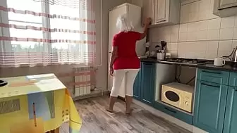 Stepmom with a huge rear-end licks wang and has anal sex with her son in the kitchen